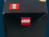 a box with a dog made out of legos