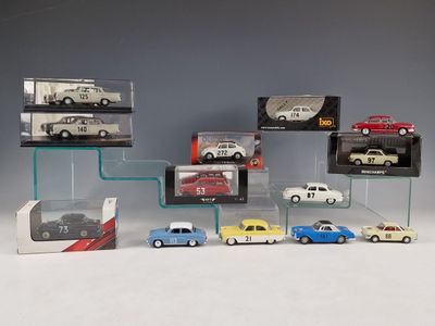 a lot of toy cars on display in a display case