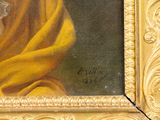 painting of a woman with a yellow scarf in a gold frame