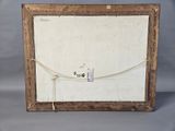 an old picture frame with a piece of paper taped to it
