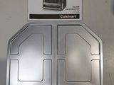 a metal tray with two compartments on top of it