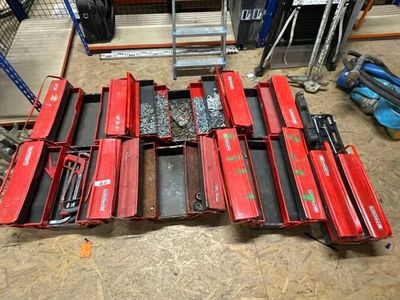 a lot of tools that are sitting on the floor