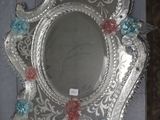 a mirror that is hanging on the wall in the room