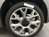 a close up of a car tire with a sticker on it