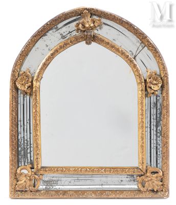 an image of a mirror with a gold frame and a white background