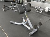 a gym equipment that is sitting on the floor in the gym