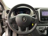 the interior of a car with a steering wheel and dashboard controls