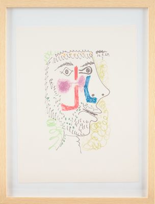 an image of a drawing of a man ' s face in a wooden frame