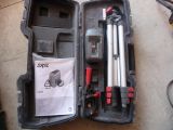 a tool box with a tripod and a camera in it