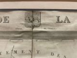 an old newspaper with a picture of a man on it