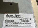 a label on the back of a machine that is sitting on a table