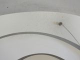 a clock on the ceiling of a building with a clock on it