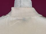 a close up of a white shirt on a mannequin mannequin mannequin mannequin mannequin mannequin mannequin manne