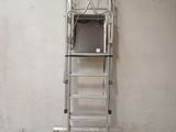 a ladder that is leaning against a wall in a room
