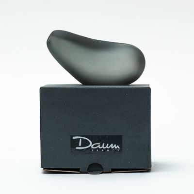 a black box with a gray object on top of it