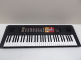 a close up of an electronic keyboard on a table