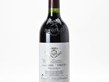 a bottle of wine that is sitting on a table