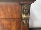 an image of a wooden cabinet with a marble top