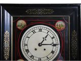 a black and white clock with a red border around it