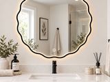 a bathroom with a sink and a mirror on the wall