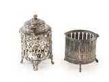 pair of silverplated candlesticks and a silverplated sugar dish