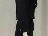 an image of a black coat on a mannequin stand