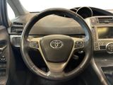 dashboard view of a car with a steering wheel and dashboard controls