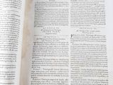 a book open to a page of text on a table
