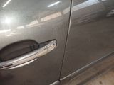 a close up of a door handle on a car
