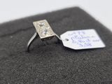 a diamond ring with a price tag attached to it