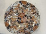 three plates with different designs on them on a table