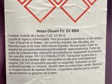 a sticker on the back of a purple refrigerator