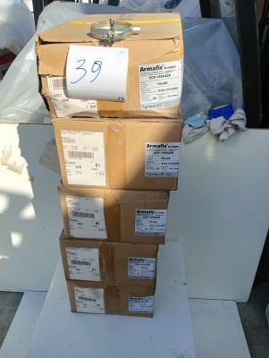 boxes stacked on top of each other in a pile on top of a table