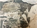a picture of a picture of a mountain town