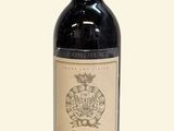 a bottle of wine that is sitting on a table
