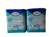 deux paquets de lingettes hygiéniques Tena empilés l'un sur l'autre