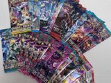 a close up of a bunch of pokemon cards on a table