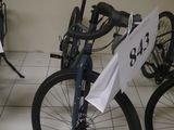 two bikes that are parked in a room