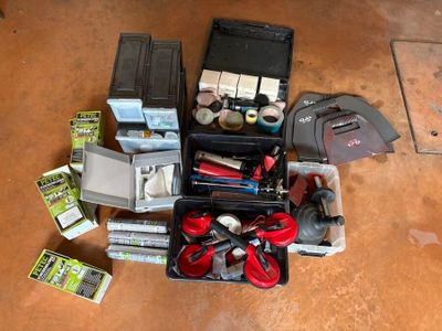 a lot of tools that are sitting on the floor