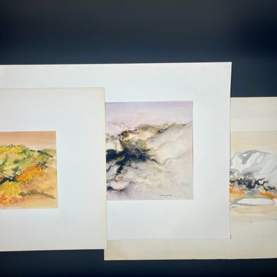 trois aquarelles représentant des montagnes et des arbres sur fond noir