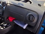 a car dashboard with a cloth on it and a cloth on the dash