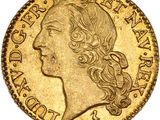 une pièce d'or à l'effigie d'une femme aux longs cheveux