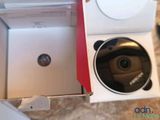 a box with a camera inside of it on the floor
