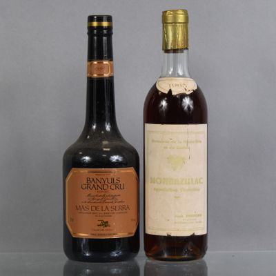 deux bouteilles de vin posées l'une à côté de l'autre sur une table