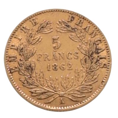l'image d'une pièce d'or ornée d'une couronne