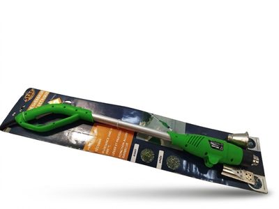 a close up of a pair of scissors with a green handle