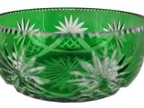 an image of a green glass bowl on a white background