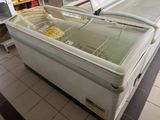 two refrigerated refrigerators sitting in a store