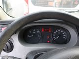 dashboard of a car with a steering wheel and gauges on it