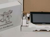 a box with a tablet in it on a table